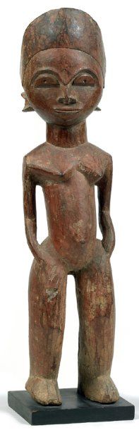 null Lobi. (Burkina-Faso) Bois. H.: 58 cm Belle statuette féminine debout aux bras...