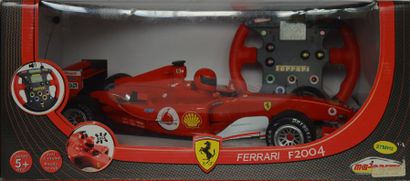 null Ferrari F1 2004
Échelle 1/12ème, à moteur électrique, radiocommandée, par MAJORETTE
Jouet...