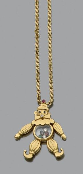 CHOPARD Pendentif en or jaune 18k (750) figurant un clown articulé, orné sous plexiglass...