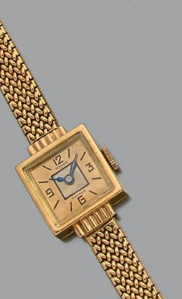 TORDO Montre de dame en or jaune 18k (750), cadran carré, bracelet tressé.
Pb: 32,6...