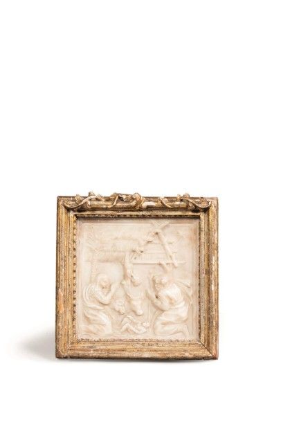 null Plaque en albâtre sculpté représentant la Nativité 

dans un cadre en bois doré

Europe...