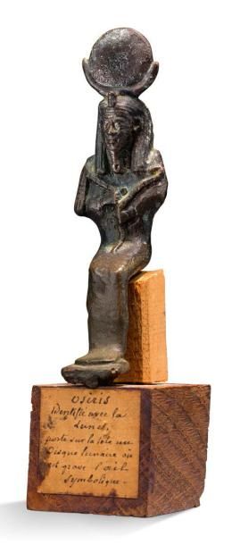 null STATUETTE D'OSIRIS KHONSOU assis, coiffé d'un disque lunaire orné d'un uraeus...