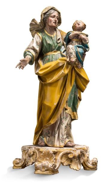 null STATUETTE DE CRÈCHE en bois polychrome représentant la Vierge à l'enfant, les...