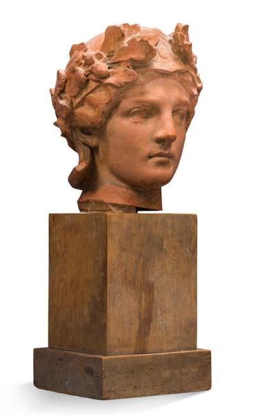 Auguste CARLI (1868-1930) Terre cuite représentant une tête romaine
Dédicacée à l'arrière...