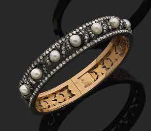 null Bracelet jonc en or rose 18K (750) argent (<800) orné d'une ligne de perles...