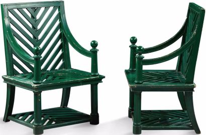 EMILIO TERRY (1860-1969) Paire de fauteuils laqués verts à dossier et assise ajourés...