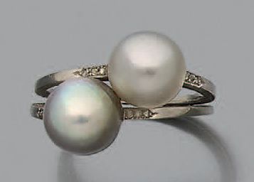 null Bague "toi & moi" en platine (950) sertie de deux perles fines
- non testées...