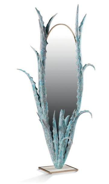 ALAIN CHERVET (né en 1944) Important miroir ovale modèle "Aloés
Psyché" à encadrement...