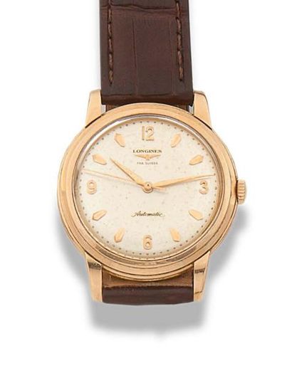 LONGINES.Vers 1950 
Modèle homme automatique en or rose 18K (750). Cadran argenté,...