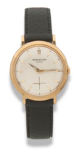 JAEGER-LECOULTRE.Vers 1950 
Modèle homme en or jaune automatique.
Cadran argenté,...