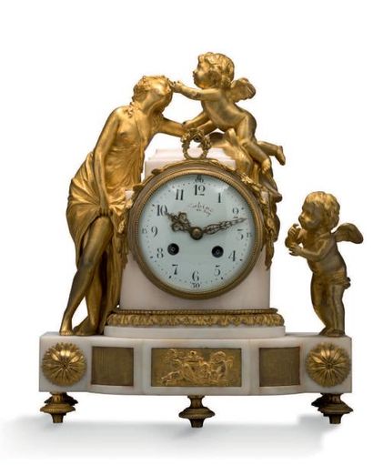 null PENDULE en marbre blanc et bronze doré, représentant
Vénus jouant avec deux...