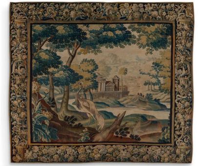 null TAPISSERIE à décor de paysage de verdure et d'un échassier sur fond de château.
Bordure...