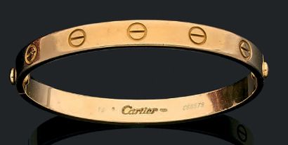 CARTIER "Love"
Bracelet jonc en or jaune 18k (750).
Signé et numéroté. Avec son tourne...