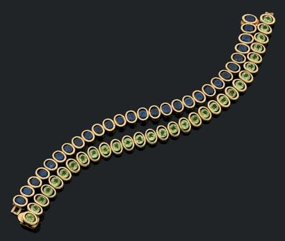 RENE BOIVIN Ensemble de deux bracelets articulés en or jaune 18k (750) l'un composé...
