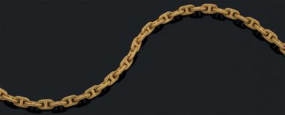 HERMES Collier "chaine d'ancre" en or jaune 18k (750) tressé. Signé et numéroté....