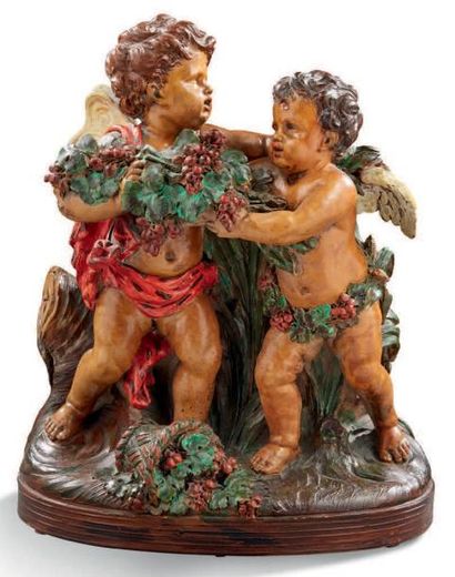 G. CHOLIN 
Deux putti portant des grappes de raisin
Sculpture en terre cuite polychrome
XIXe...