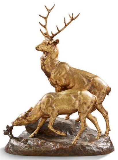 Jules Edmond MASSON (1871-1932) 
Cerf et biche sur un rocher
Epreuve en bronze doré,...