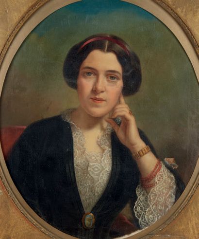 École Française du XIXe siècle 
Portrait de femme peint dans un ovale Huile sur toile...