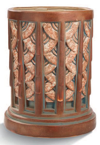 MOUGIN à Nancy 
Grand vase en céramique émaillée polychrome en forme de colonne.
Signé...