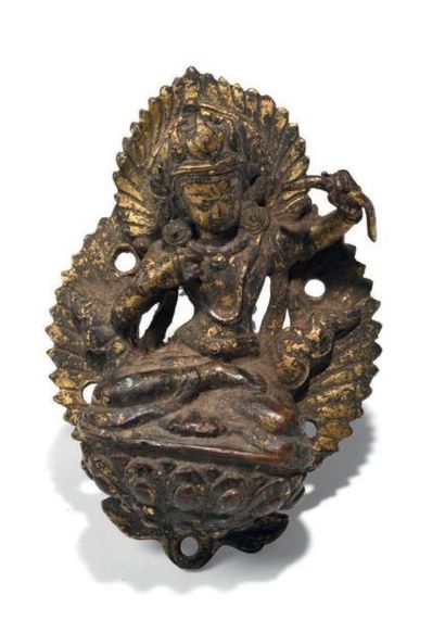 TIBET XVIIE-XVIIIE SIÈCLE Petit sujet en bronze avec traces de dorure, représentant...