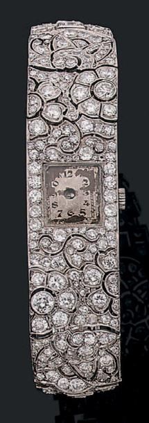 null Montre de dame en platine (950) cadran intégré au bracelet articulé de deux...
