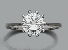 null Bague solitaire en or gris 18k (750) sertie d'un diamant de taille moderne
Tour...