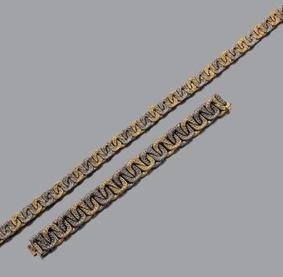 GEORGES LENFANT Parure "paillette" comprenant un collier et un bracelet composés...