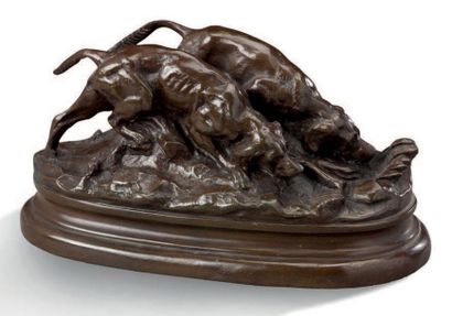 ANTOINE-LOUIS BARYE (1796-1875) Deux chiens de chasse
Bronze patiné signé BARYE et...