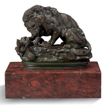 ANTOINE-LOUIS BARYE (1796-1875) Lion attaquant un serpent
Epreuve en bronze à patine...