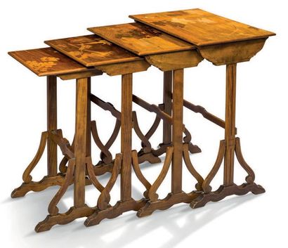Émile GALLÉ (1846-1904) Tables à thé de forme gigogne en marqueterie à décor de végétaux....