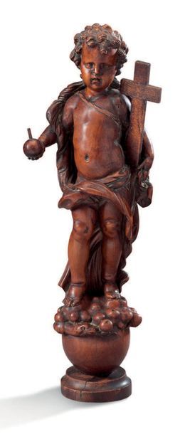 null STATUETTE en buis représentant l'enfant Jésus sur un globe enserré par le serpent.
Il...