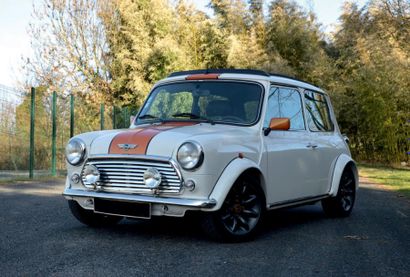 1999 - MINI COOPER 1300 MPI SPORTSPACK Lancée en 1959 par la British Motor Corporation,...