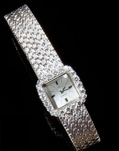 null OMEGA

Montre de femme en or gris 18k (750) , le cadran rectangulaire serti...