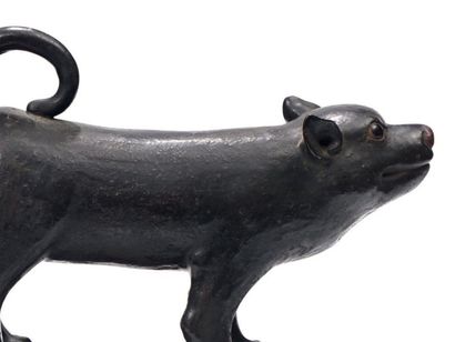 CHINE Sujet en céramique vernissée brun représentant un chien campé sur ses pattes,...