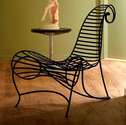 null ANDRE DUBREUIL (né en 1951)

"Spine Chair"

Paire de fauteuils en fer battu...