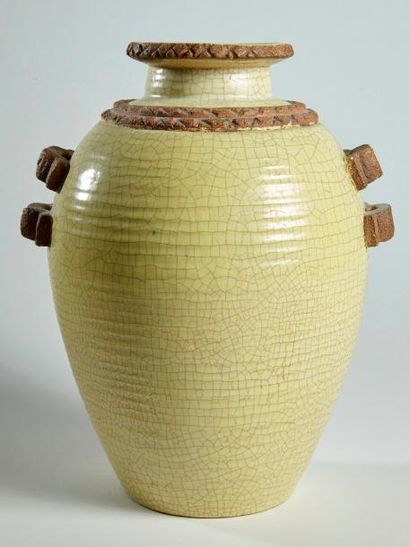 null Luc LANEL (1893-1965), attribué à

Vase ovoïde à deux anses doubles en céramique...