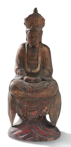 CHINE FIN XIXE SIÈCLE, DANS LE STYLE DES MING Sujet en bois représentant Guanyin
Avalokiteshvara...