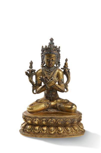 TIBET XVIIIe-XIXe siècle Sujet en bronze doré représentant
Vajradhara assis en méditation...