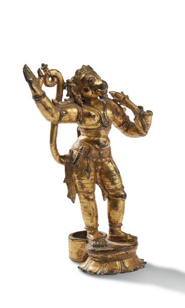 NEPAL XIXe SIÈCLE Statuette en bronze doré, représentant
Hanuman dansant sur un lotus.
H....