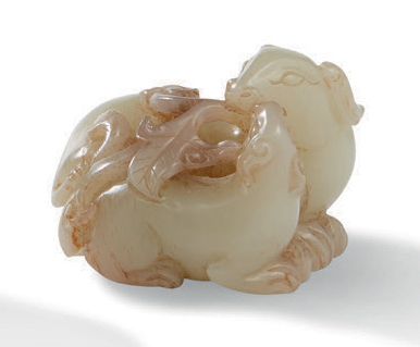 CHINE XXe siècle Petit groupe en jade sculpté partiellement veiné de rouille, représentant...