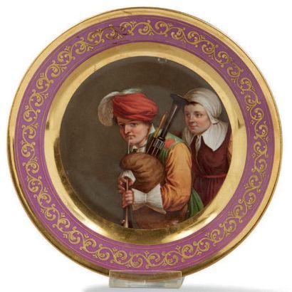 MEISSEN Assiette en porcelaine à décor d'un joueur de cornemuse
XIXe siècle Diamètre:...
