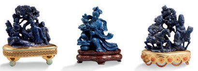 CHINE XXe siècle Trois groupes en lapis-lazuli teinté et sodalite représentant une...