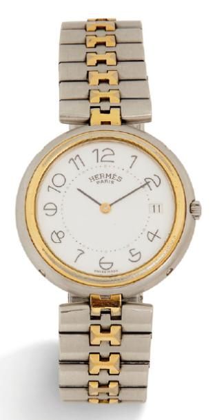 HERMES Montre "Clipper" en acier et métal doré, cadran blanc, chiffres arabes, date...