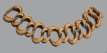 null Bracelet articulé en or jaune 18K (750) ciselé et composé de grands maillons...