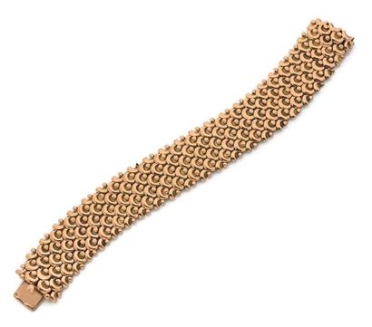 RENE BOIVIN Bracelet écailles en or jaune 18k (750).
Usures
Long.: 20.5cm env.
Pb.:...