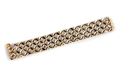 VAN CLEEF and ARPELS Bracelet articulé en or jaune et gris 18K (750) composé d'une...