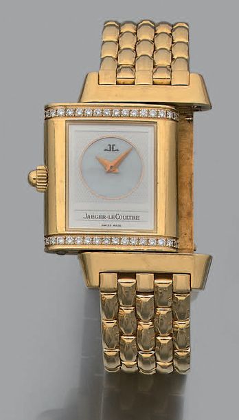 JAEGER LECOULTRE "Reverso Duetto"
Montre bracelet de femme en or jaune 18k (750)...