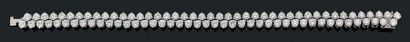 GUBELIN "RIVIÈRE DE DIAMANTS"
Bracelet, deux rangs de diamants ronds, or gris 18K...