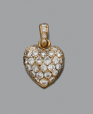 CARTIER Pendentif "coeur" diamants et or jaune 18K (750). Signé et numéroté.
Dim.:...