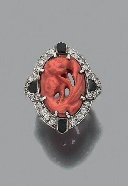 null RING "ENGRAVED CORAIL"
Coral engraved with flowers, onyx and old-cut diamonds,...